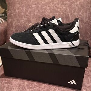 Adidas women’s Black and White Sneakers